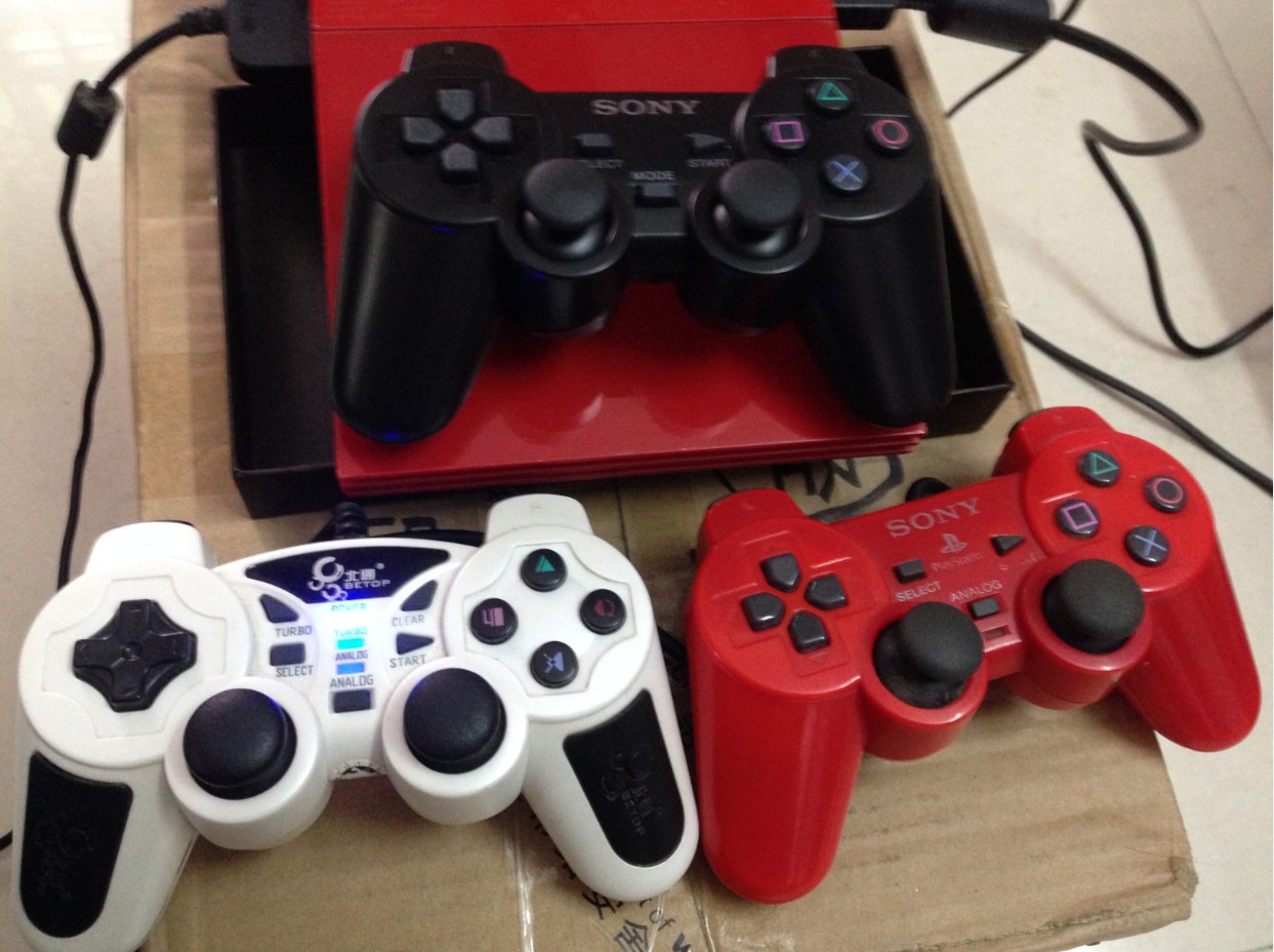 出售PS2红色限量版9万型直读破解(送三个手柄