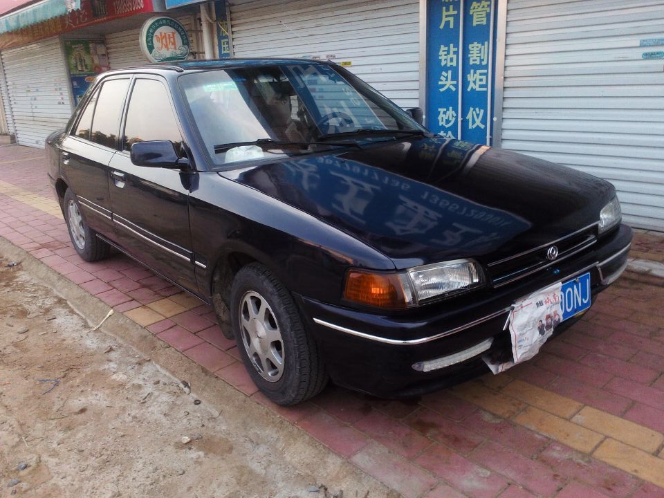转让02年海南马自达323/1.2w