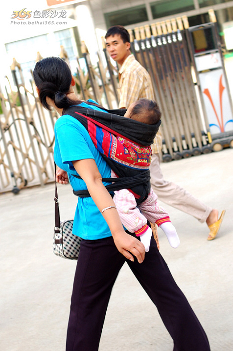 游山玩水 帖子  奇怪的是很少见到穿着民族服装的行人,毕竟是毛南族