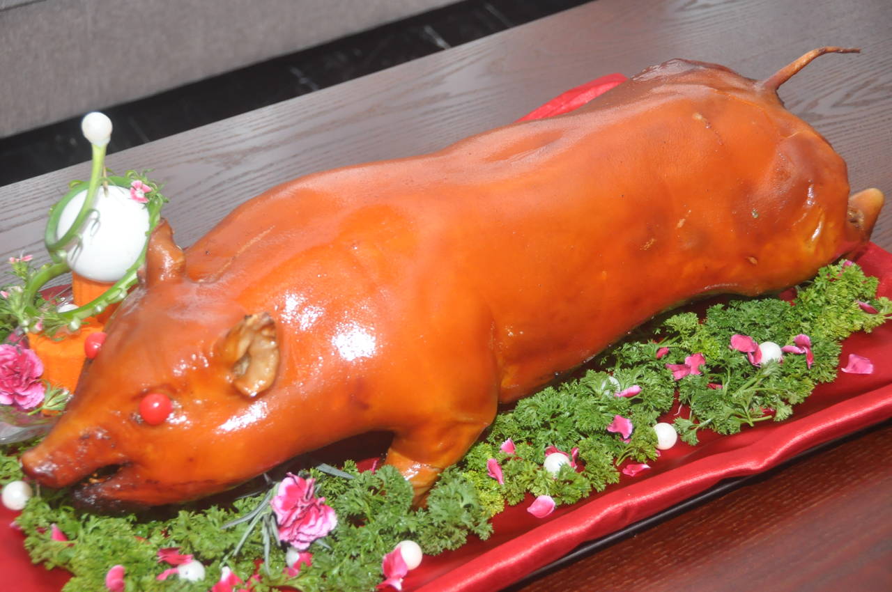 清明时节食纷纷小编这就给你网罗北海最新的清明烧猪预定信息大全